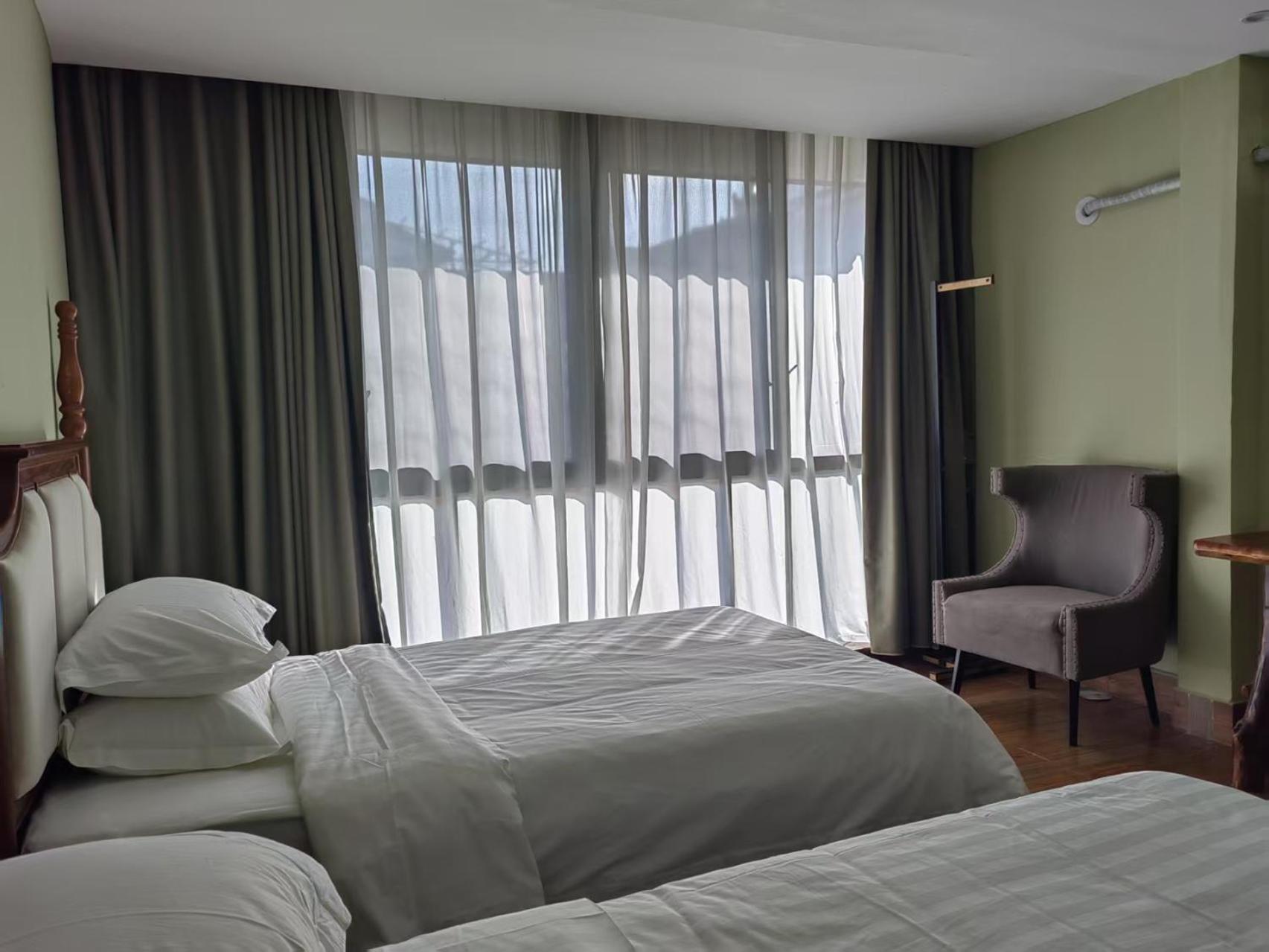 Serene Vale Inn Guilin-Free One Way Pick Up Service To High-Speed Railway Station For 2 Nights Rum bild