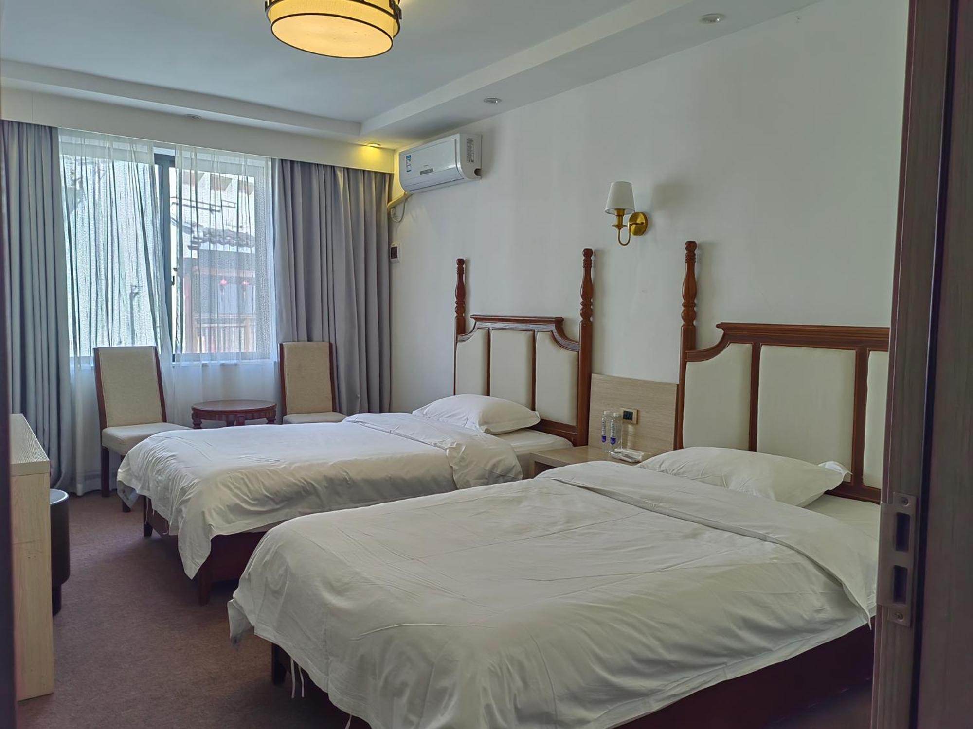 Serene Vale Inn Guilin-Free One Way Pick Up Service To High-Speed Railway Station For 2 Nights Rum bild