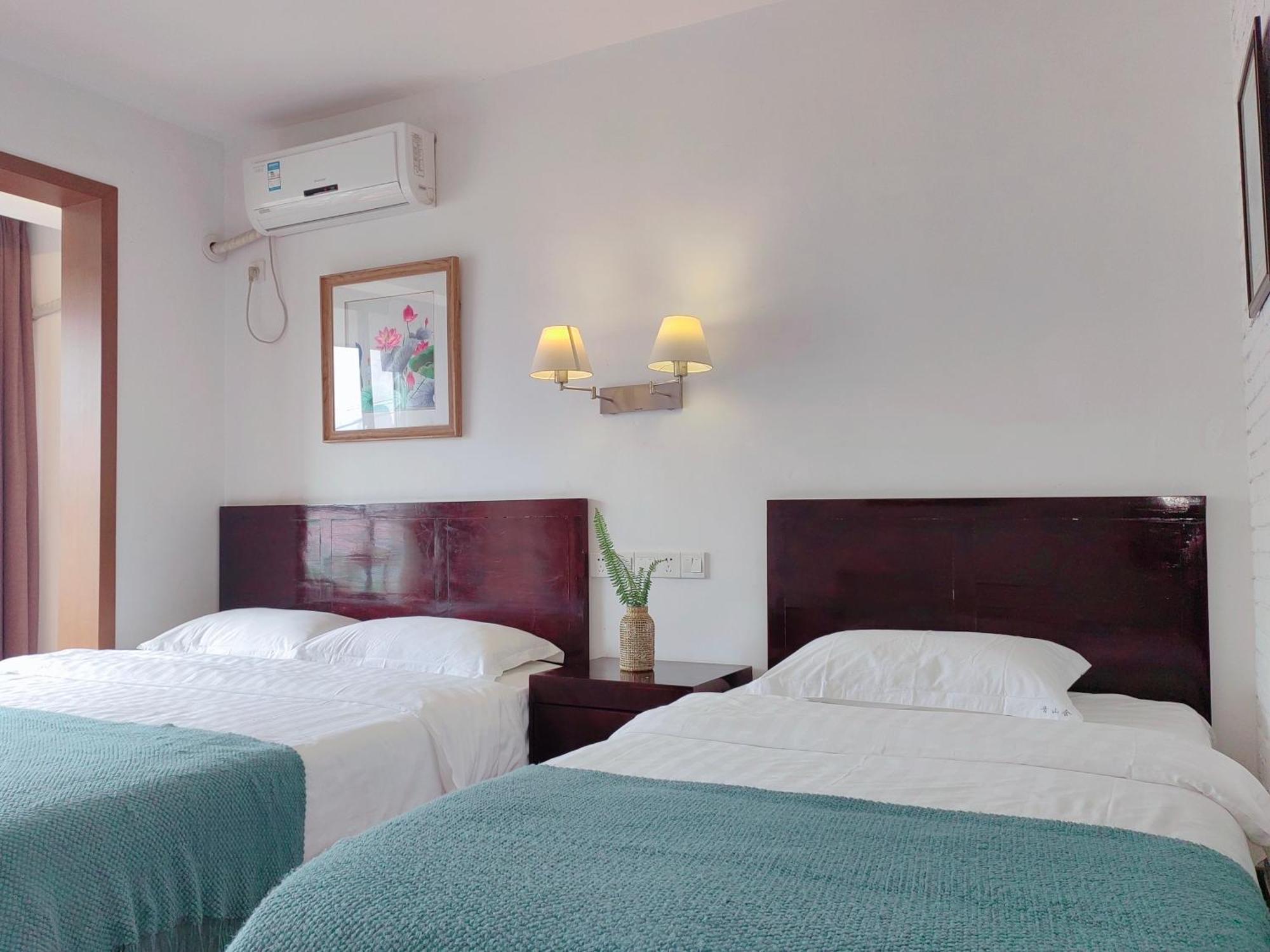 Serene Vale Inn Guilin-Free One Way Pick Up Service To High-Speed Railway Station For 2 Nights Rum bild